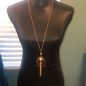 Dangly gold necklace